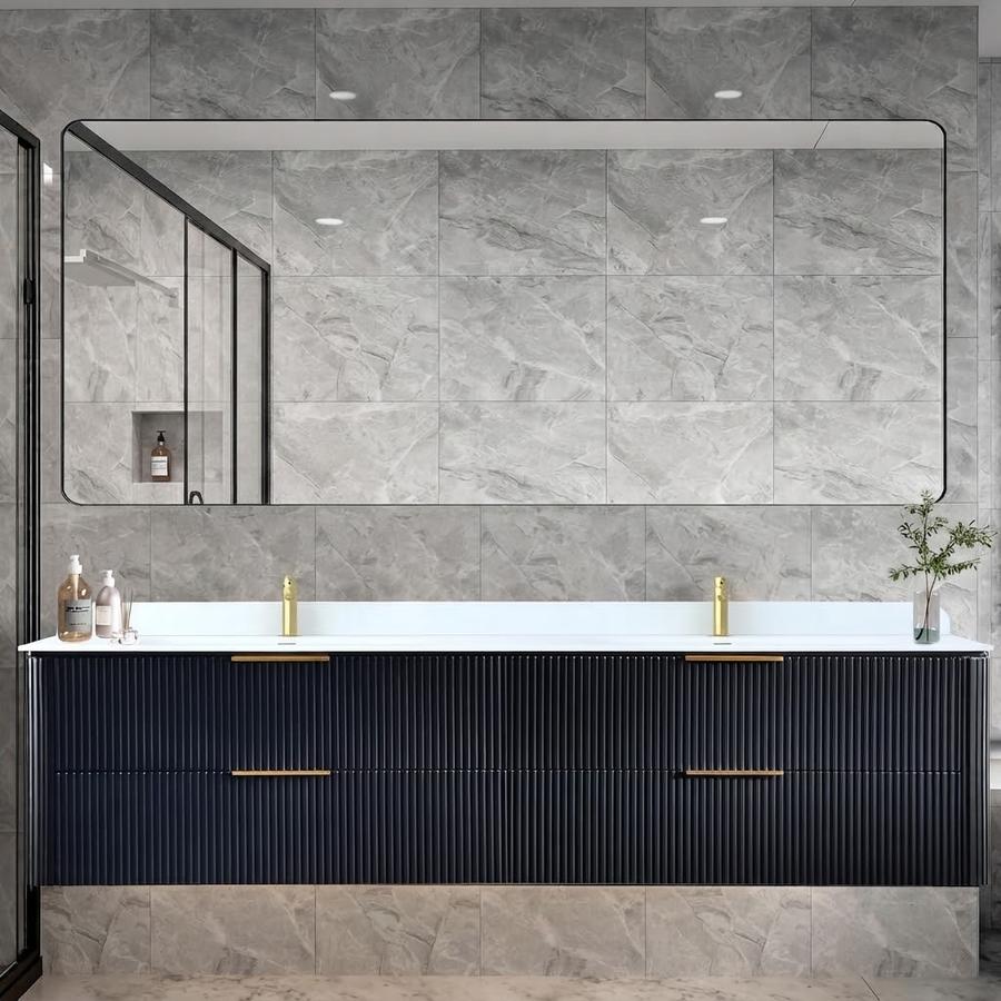 Matte black framed mirror above a double vanity